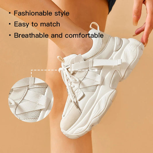 White sneaker being worn with text highlighting features on a beige background