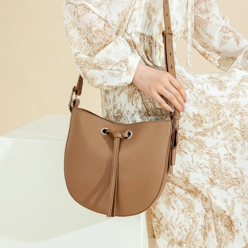 The Cordelia Cow Leather Metal Buckle Solid Long Strap Bucket Bag