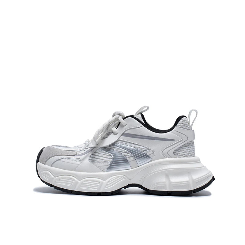 White sneaker with black accents on a white background