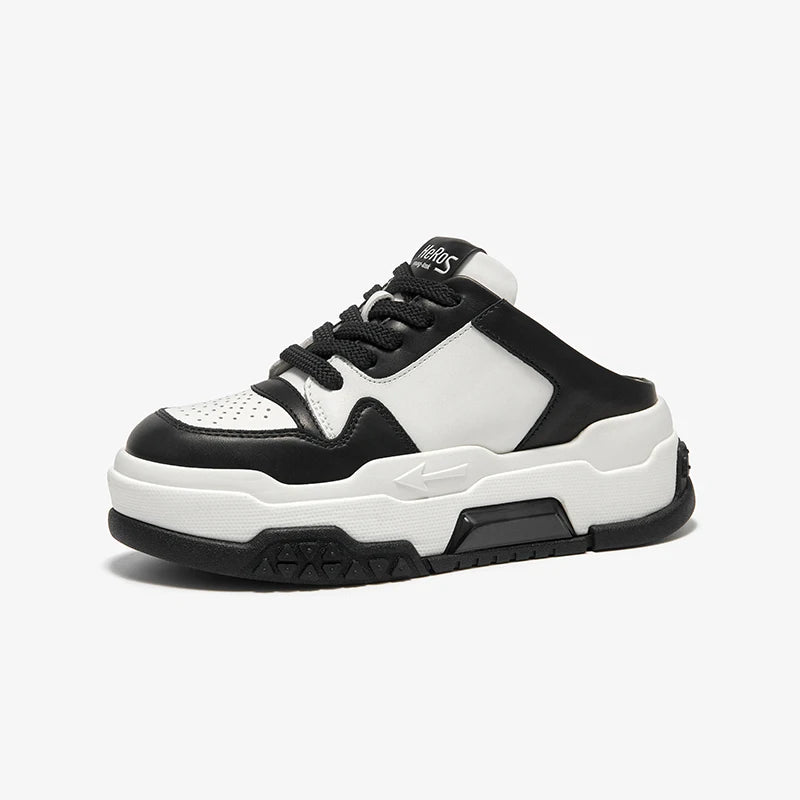 Black and white sneaker on a light gray background