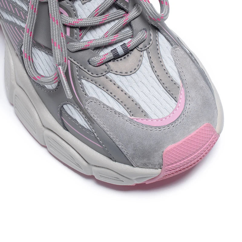 Gray and pink sneaker on a white background