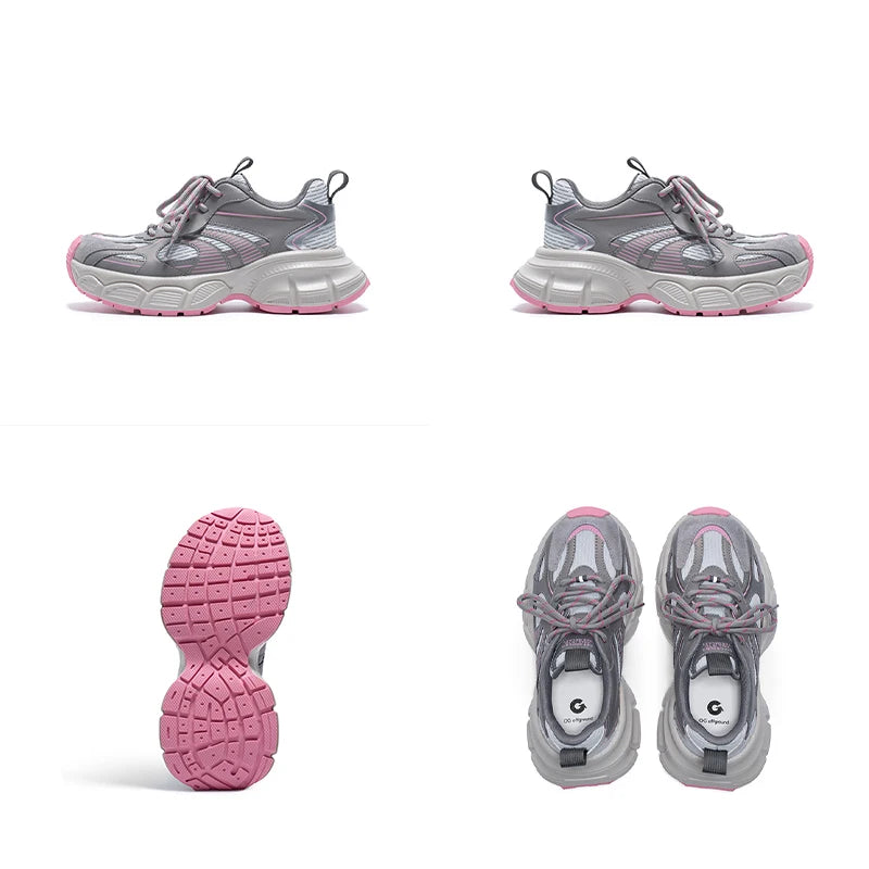 Gray and pink sneakers on a white background