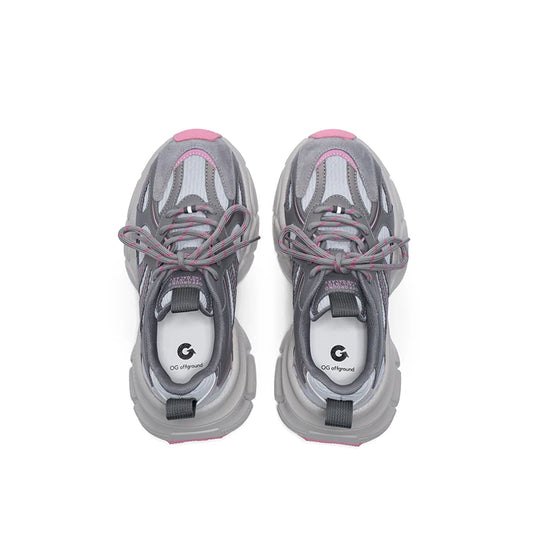 Pair of gray sneakers with pink accents on a white background